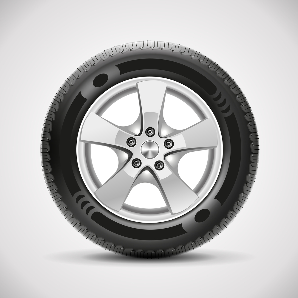 new tyre on plain background